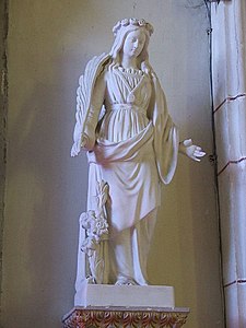 Sainte Marguerite d'Antioche à droite de l'autel du Saint-Sacrement.