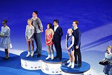 Awarding of winners in pair skating, World Figure Skating Championships in Helsinki 2017.jpg