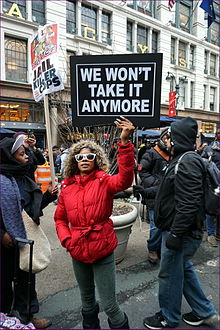 Black Lives Matter protester at Macy's Herald Square, November 2014 Black Lives Matter Black Friday (15902086996).jpg