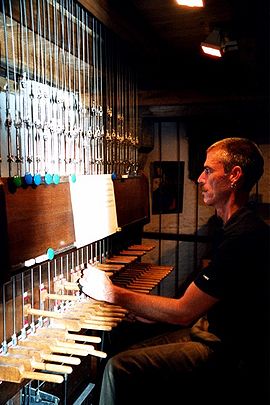 Carillonneur Brian Swager plays the carillon at the Cathedral Saint-Jean-Baptiste (John the Baptist) in Perpignan, France.