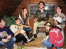 The University of Nebraska Lincoln cymbal players celebrating a holiday party in the attic.