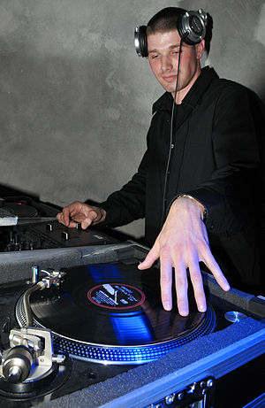 English: Club Eifel disc jockey DJ Blaze plays...