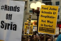Rally against U.S. involvement in Syria in New York in April 2017 HandsOffSyria emergency rally & march "Fund Jobs, Schools, & Hospitals -- Not War in Syria!" (33075677464).jpg