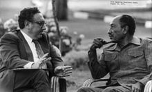 Egyptian leader Anwar Sadat with Henry Kissinger in 1975 Henry Kissinger with Anwar Sadat cph.3b13868.jpg
