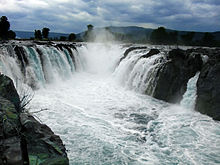 Tourism contributes significantly to the GDP of the region; Pictured is Hogenakkal Falls fored by Kaveri river Hogenakkal Falls Close.jpg