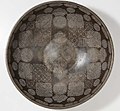 Bowl inscribed with Quranic verses, prayers, and magic squares; 16th century India, high-tin bronze