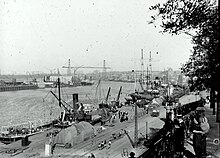1912 photo of the busy Nantes dock, with two large ships