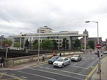 The O'Donovan Rossa Bridge with traffic flowing, with the Dublin City Council building in the background