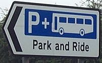 A road sign for park and ride.