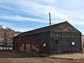 Empty warehouse, 2985 Huron Street, looking east. Later demolished for Griffis North Union.