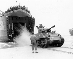 LST-517 offloading a Sherman tank of the French 2nd Armored Division, August 1944