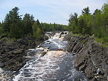 Tilted beds of the Middle Precambrian Thomson Formation in Jay Cooke State Park StLouisRiver JayCooke.JPG