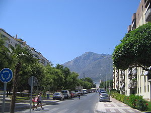 Spaniards finally getting a deal they could not resist: choice holiday homes for half the price of properties on the market - Street in Marbella, Spain 2005.