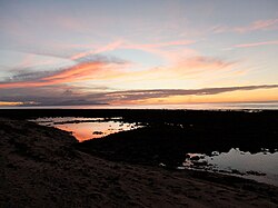 Sonnenuntergang bei Ebbe vor Adara