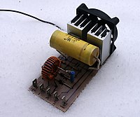 Zero voltage switched mode power supplies require only small heatsinks as little energy is lost as heat. This allows them to be small. This ZVS can deliver more than 1 kilowatt. Transformer is not shown. ZVS SMPS.JPG