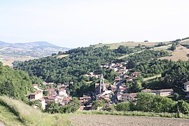 The church and surrounding buildings in Courzieu