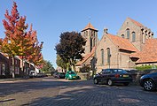 Beek en Donk, Kirche (de Sint Michaëlkerk) in der Straße