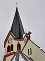 Zvonik in streha s križi