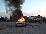 First demonstrations calling for the downfall of the regime in Bayda, Libya. During the demonstration, burning a police car, at the crossroads of At-Talhi, now known as the crossroads of the spark, on 16 February 2011