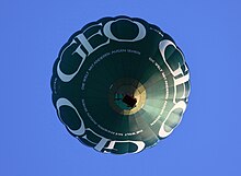 Hot air balloon displaying advertising for GEO magazine Heissluftballon over Uetersen 3493 1.jpg