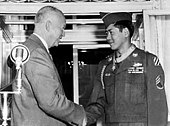 Staff Sergeant Hiroshi Miyamura, a Japanese American U.S. Army soldier and POW with President Eisenhower, after receiving the Medal of Honor in 1953 for meritorious service in the Korean War Hiroshi Miyamura and Eisenhowser.jpg