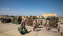 Marines of 2nd Battalion, 7th Marines packing up gear to withdraw from Al-Taqaddum Air Base, 24 March 2020 Marine Corps withdrawal from Al-Taqaddum, Iraq (March 24, 2020).jpg