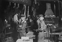 Child labourers in an Indiana glass works. Labor unions have an objective interest in combating child labour. Midnight at the glassworks2.jpg