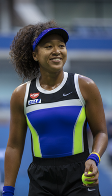 Naomi Osaka smiling during her match against Azarenka in the 2020 US Open.