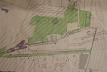 Vue du plan d'un site préhistorique matérialisant l'emplacement des fouilles.