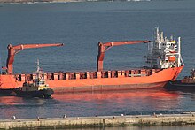 Russia's Lady R disembarking Simon's Town Naval Base early on Friday, 9 December 2022 following its secretive and controversial docking. Russia's Lady R Leaves Simons Town 01.jpg