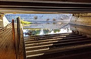 Under US Highway 101; during the dry season the underpass is used as a bicycle/pedestrian trail.