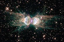 Mz 3, often referred to as the Ant planetary nebula. Ejecting gas from the dying central star shows symmetrical patterns unlike the chaotic patterns of ordinary explosions. Ant Nebula.jpg