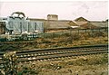 A picture of Brettell Lane railway station in 2003. the line is sill open to freight.