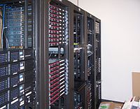 Multiple racks of servers, and how a datacente...