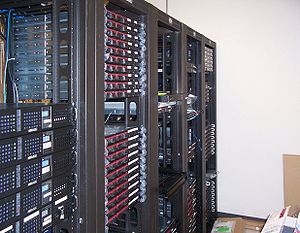 Multiple racks of servers, and how a data cent...