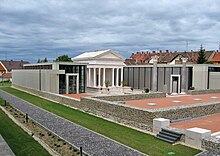 Temple of Isis in Szombathely. Rebuilt in 2011 on the site of the ruins of Roman Pannonian temple of the mysteries of Isis. Iseum (9446. szamu muemlek).jpg