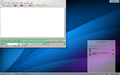 Osnovno namizje KDE 4.0.0, s prikazanim upravljalnikom datotek in sistemskimi nastavitvami