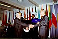 The Director of George C. Marshall European Center for Security Studies Robert Kennedy is giving a certificate to Henri Kupraşvili. 2000.05