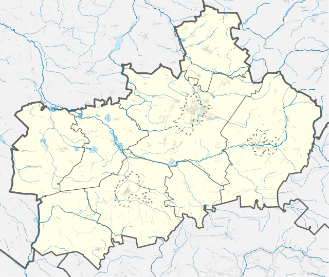 Mapa konturowa powiatu koneckiego, w centrum znajduje się punkt z opisem „Końskie”