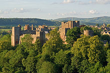 Construction of Ludlow Castle was begun shortly after the Norman invasion. Ludlow Castle from Whitcliffe, 2011.jpg