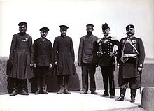 Members of the State Duma with two Russian police officers Members of State Duma of Russian Empire.jpg