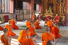 Buddhist monks in Chiang Mai Province, Thailand Monks in Wat Phra Singh - Chiang Mai.jpg