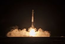 The first stage of SpaceX's Falcon 9 Flight 20 touches down at Landing Zone 1. ORBCOMM-2 (23802553412).jpg
