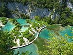 Turqois colored lakes among white rocks.