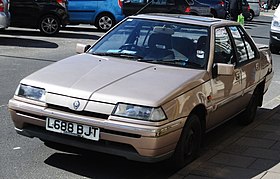 Proton Saga Iswara in Cirencester, England, U.K.jpg