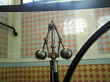 A flyball governor is an early example of a feedback control system. An increase in speed would make the counterweights move outward, sliding a linkage that tended to close the valve supplying steam, and so slowing the engine. Catalonia Terrassa mNATEC MaquinaDeVapor ReguladorDeWatt.jpg