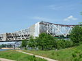 Ongoing work to paint the Kennedy Bridge. Note the far right part of the bridge painted in a three-color scheme, originally planned for the whole bridge. This was abandoned for a single-color scheme by the time Intech took over the project.