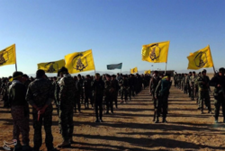 Liwa Fatemiyoun militiamen gather outside of Palmyra on 10 December in an attempt to counter the ISIL offensive. Liwa Fatemiyoun near Palmyra 1.png