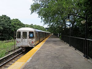 Covered platform with railroad track at right