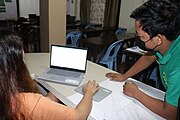 Marvin Molin, the local organizer, assists one of the participants during the tutorial session of WPWP in the Philippines 2021